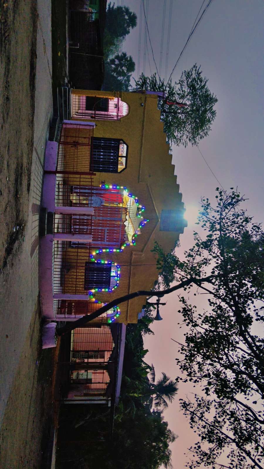 The temple facade lit for a celebration